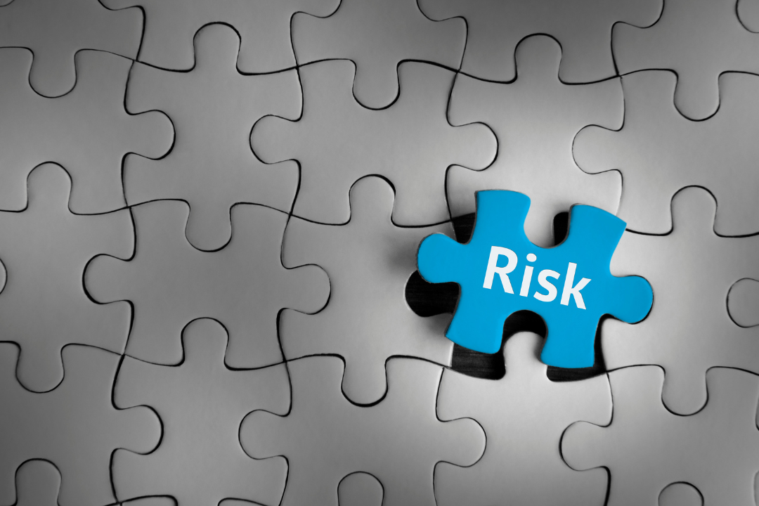 Puzzle with an outlier piece labeled 'risk' representing Leaseback Risks